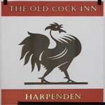 The pub sign. The Old Cock Inn, Harpenden, Hertfordshire