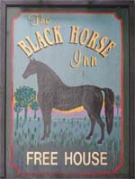 The pub sign. Black Horse, Walcote, Leicestershire
